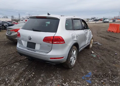 2012 Volkswagen Touareg Tdi Lux z USA, uszkodzony, nr VIN WVGEK9BP1CD008051